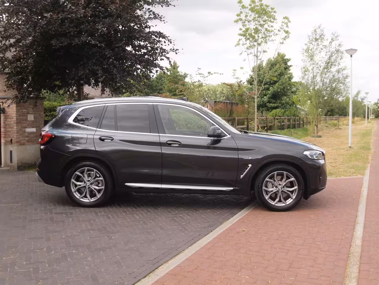 BMW X3 xDrive30e Business Edition Plus | Panoramadak | Head-Up Display | Camera | Sfeerverlichtin