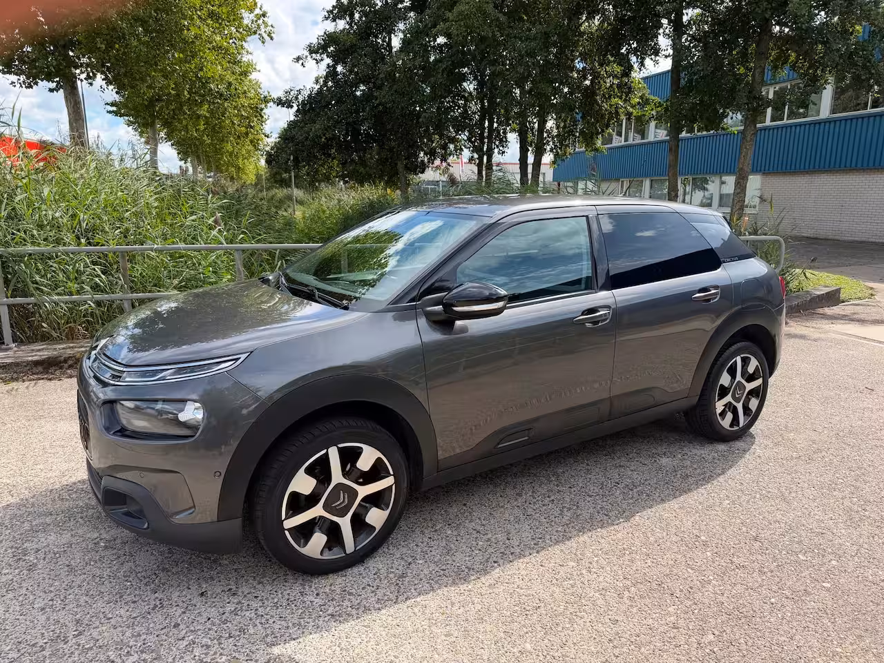 Citroën C4 Cactus 1.2 PureTech Shine Plus2021CameraLM.velgenPDCSteolverwarm