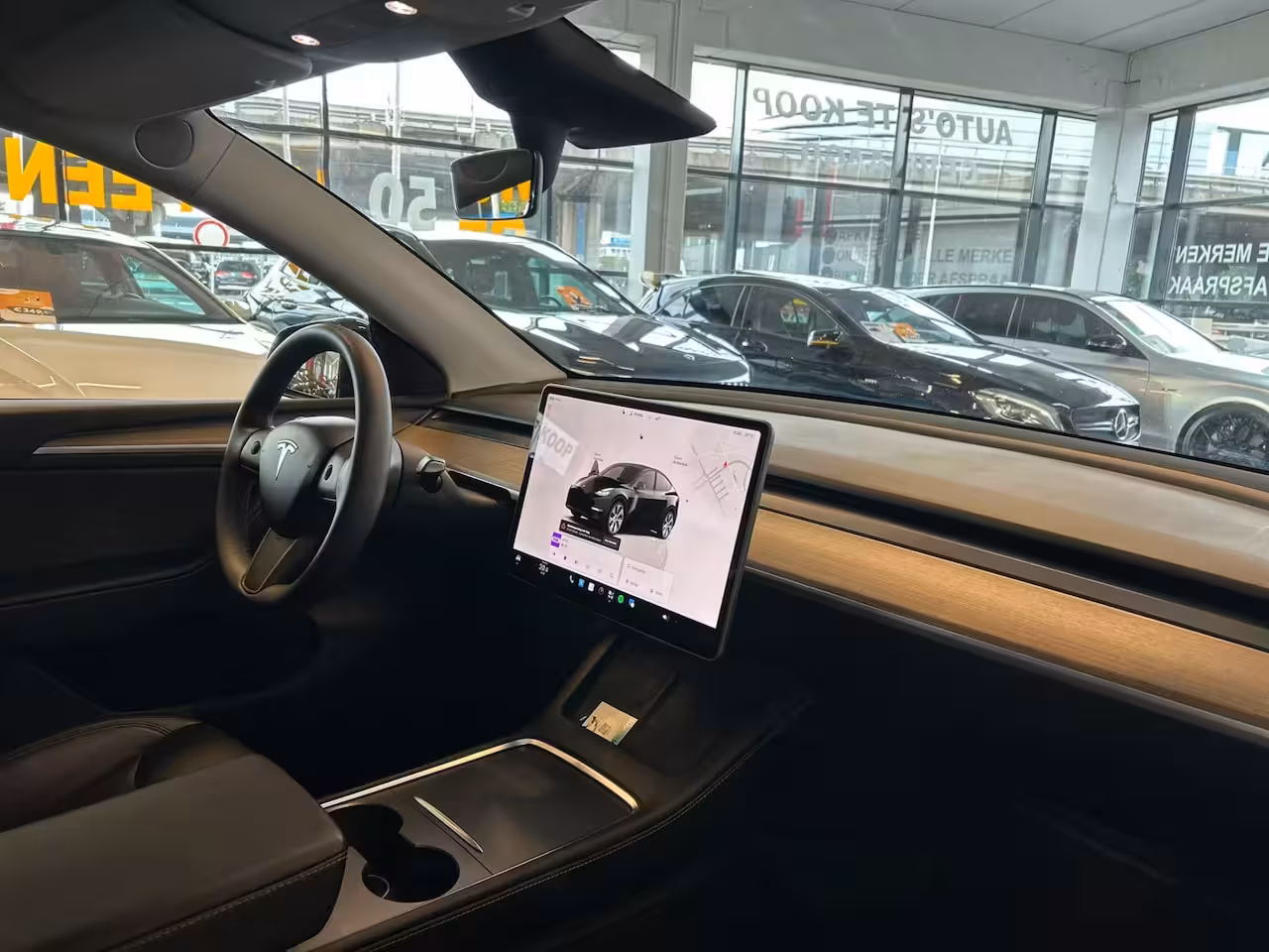 Tesla Model Y RWD 58 kWh Nederlandse auto | Panoramadak | Afneembare trekhaak | Stoelverwarming | Achter