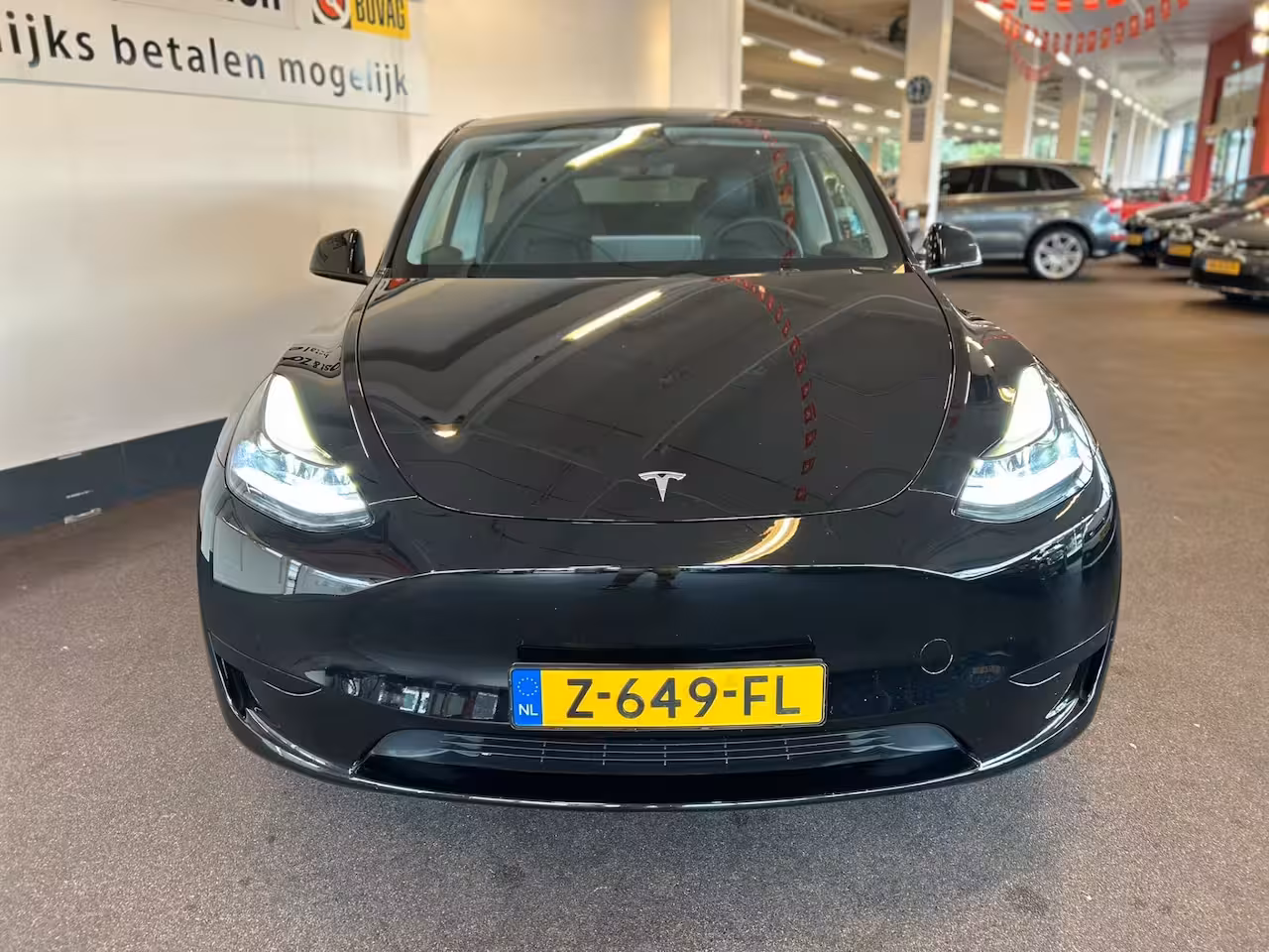 Tesla Model Y RWD 58 kWh Nederlandse auto | Panoramadak | Afneembare trekhaak | Stoelverwarming | Achter
