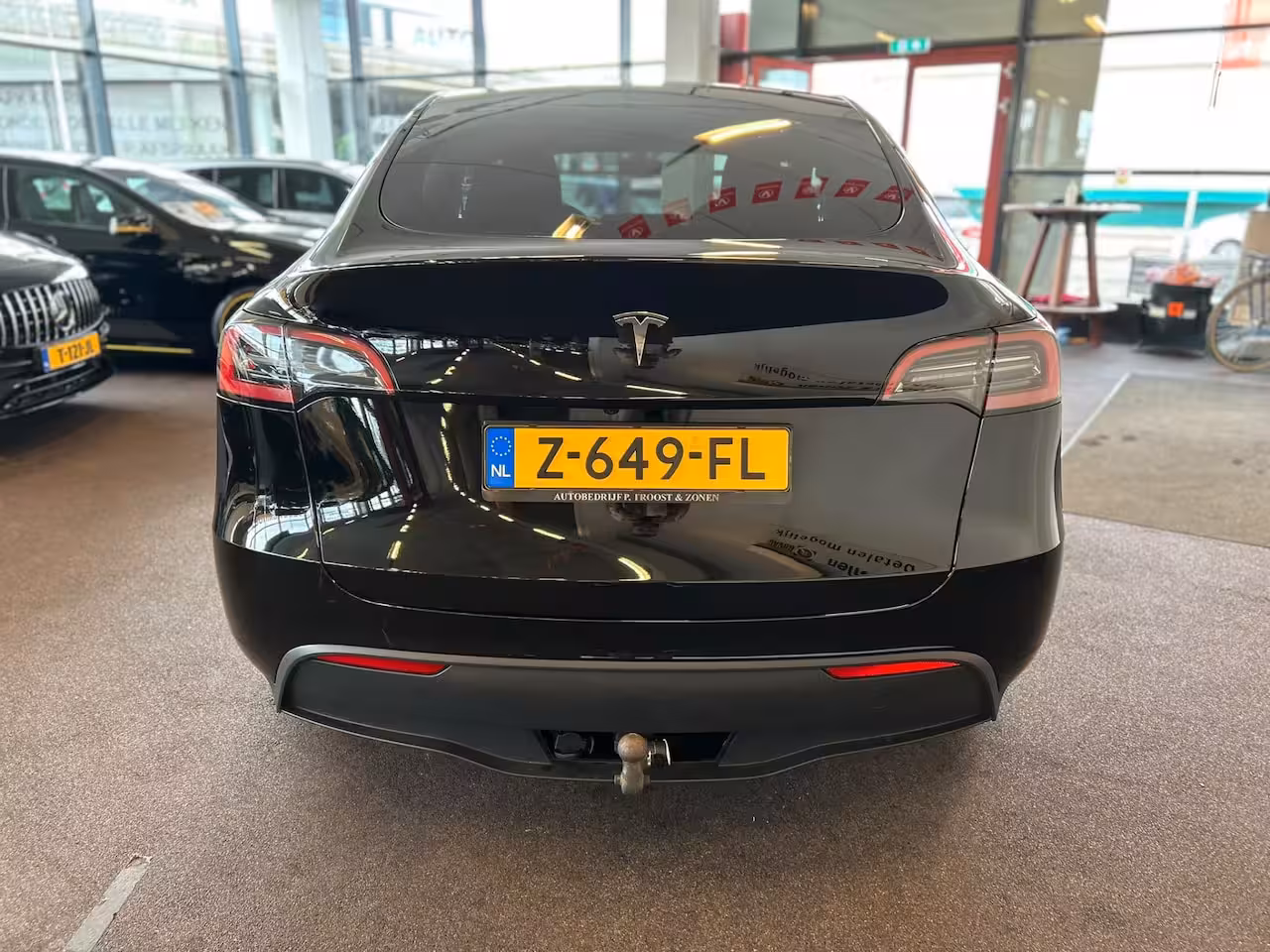 Tesla Model Y RWD 58 kWh Nederlandse auto | Panoramadak | Afneembare trekhaak | Stoelverwarming | Achter
