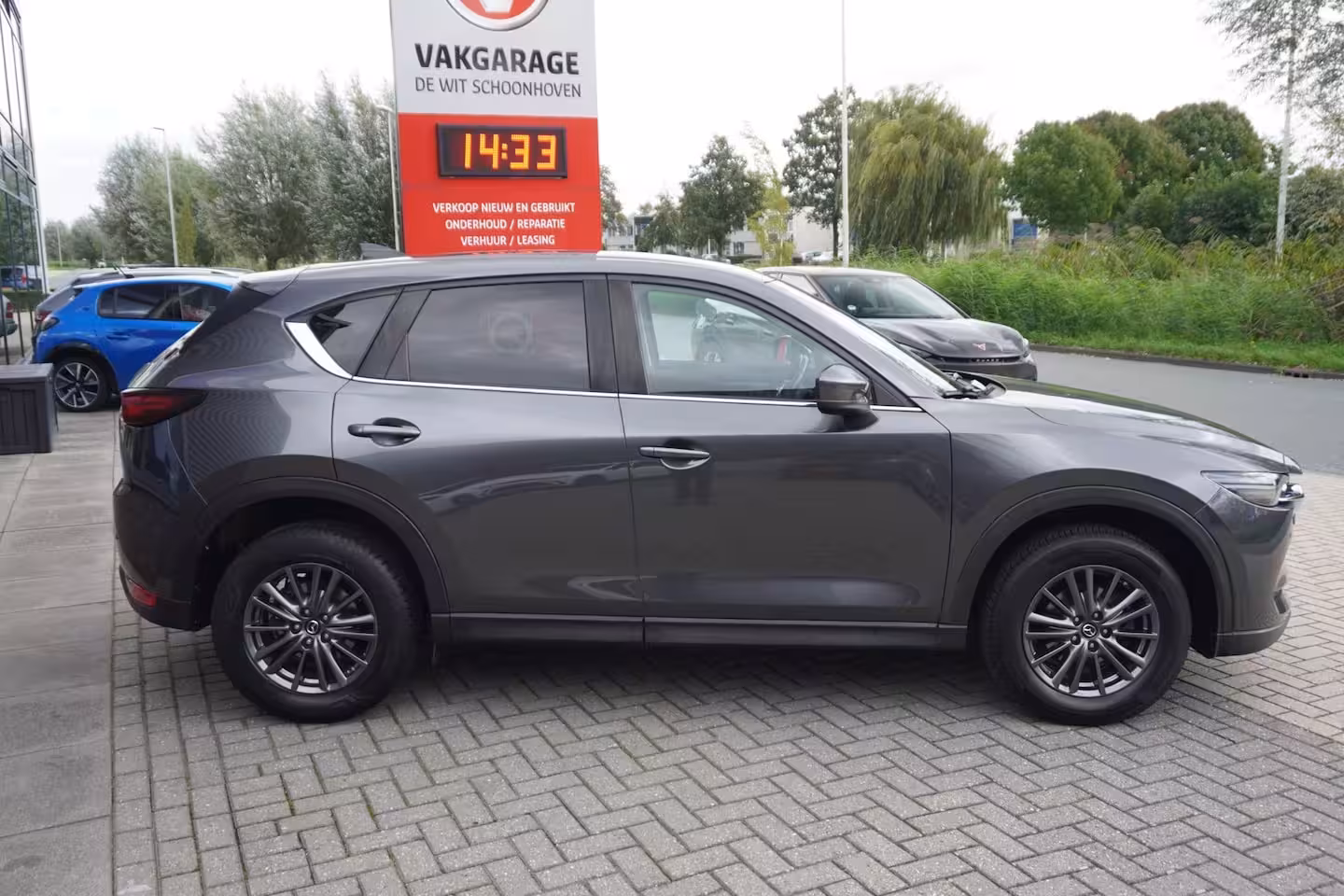 Mazda CX-5 2.0 SkyActiv-G 165 Business Comfort / Trekhaak / Carplay / Bose / Leder