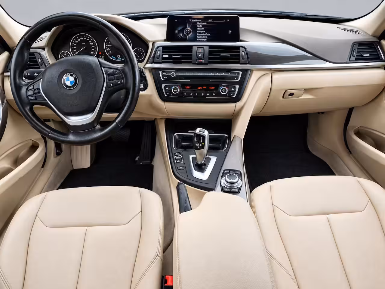 BMW 3-serie 335i | Clima | Cruise | Multimedia/Navi | Memory | Stoelverwarming | Leder | PDC + Camera