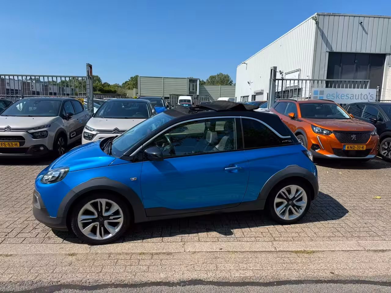 Opel ADAM 1.0 Turbo Rocks, Cabrio, Airco, Stoel/stuur verwarming, Half leder