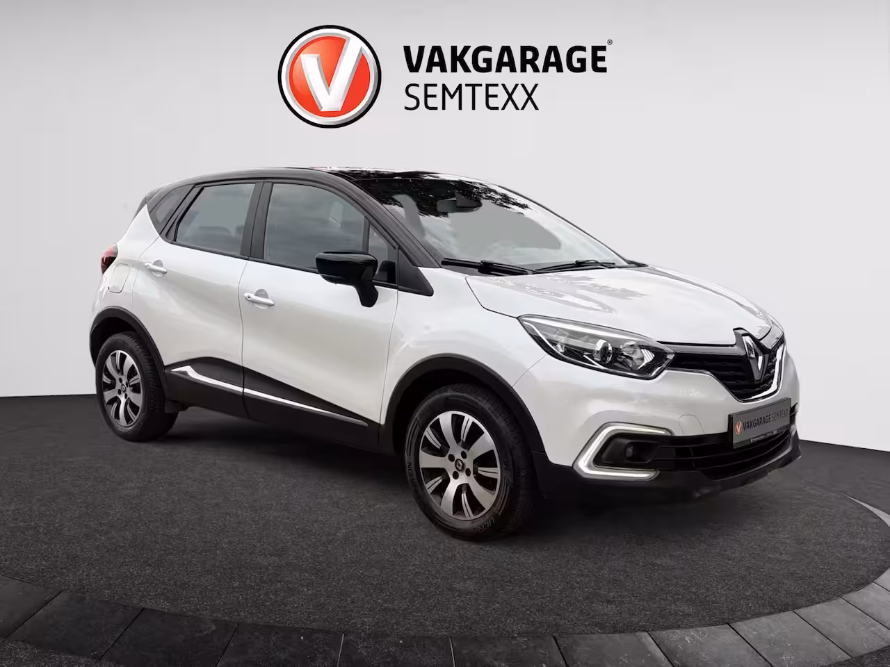 Renault Captur 0.9 TCe Intens | Clima | Cruise | Navi | PDC Achterzijde | Stoelverwarming | IsoFix | Appl
